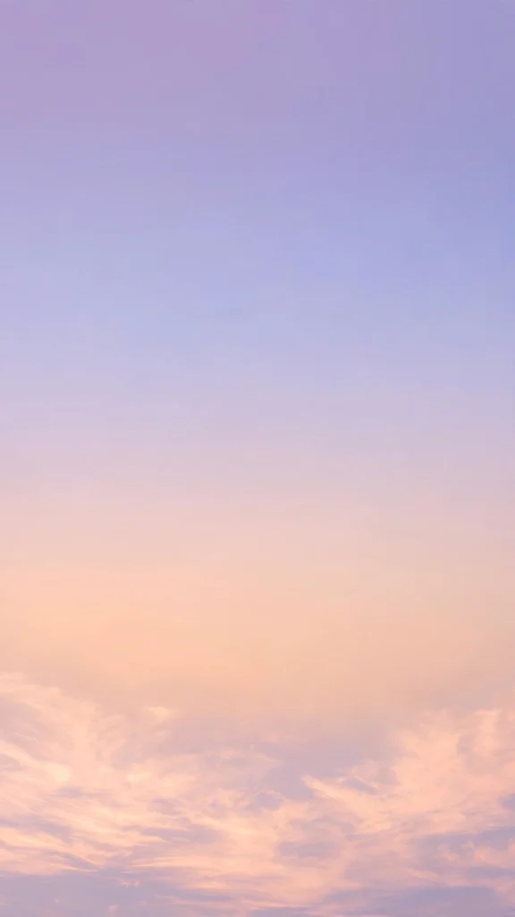 wallpaper aesthetic lock screen with soft peach to lavender dawn gradient