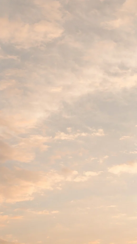 17 Wallpaper Aesthetic Home Screen Ideas for 2026 5 Neutral cloudy sky wallpaper aesthetic home screen with warm cream tones