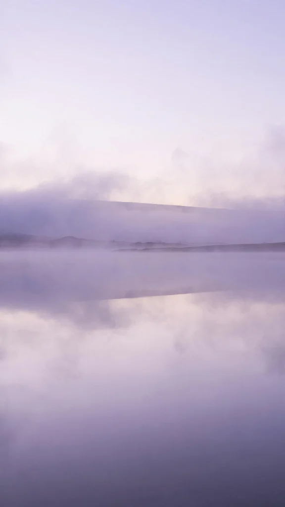 wallpaper aesthetic lock screen with misty lavender horizon over water