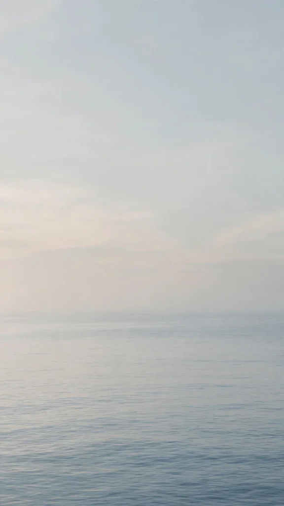 17 Best Wallpaper Backgrounds for Laptop Screens 7 Calm ocean horizon wallpaper backgrounds for laptop in a minimal seascape